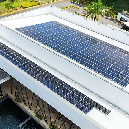 Sonesta Hotel Pereira Cerritos Exterior photo Solar panels on the roof of the National Museum of the Dominican Republic