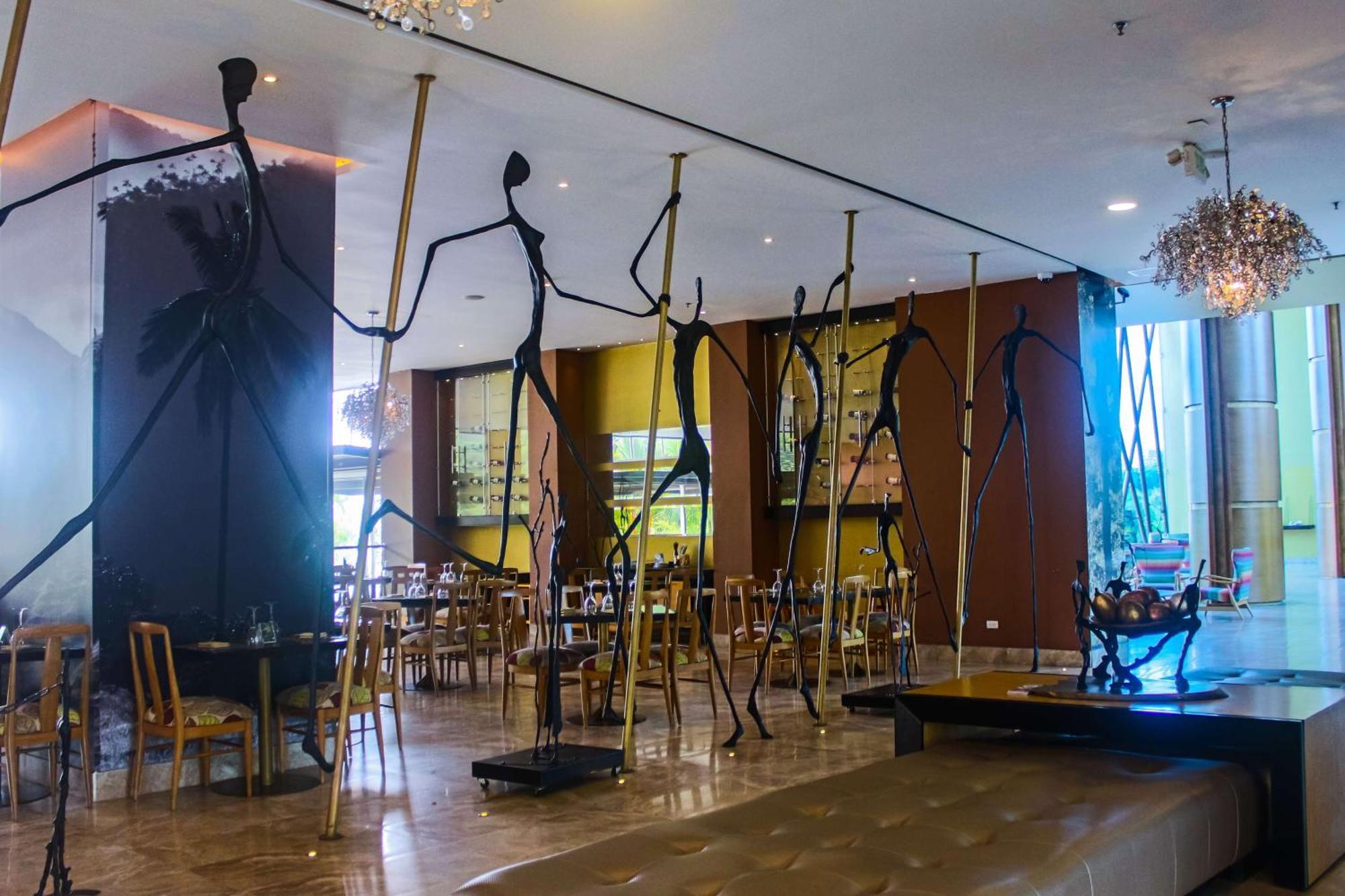 Sonesta Hotel Pereira Cerritos Exterior photo The interior of the restaurant
