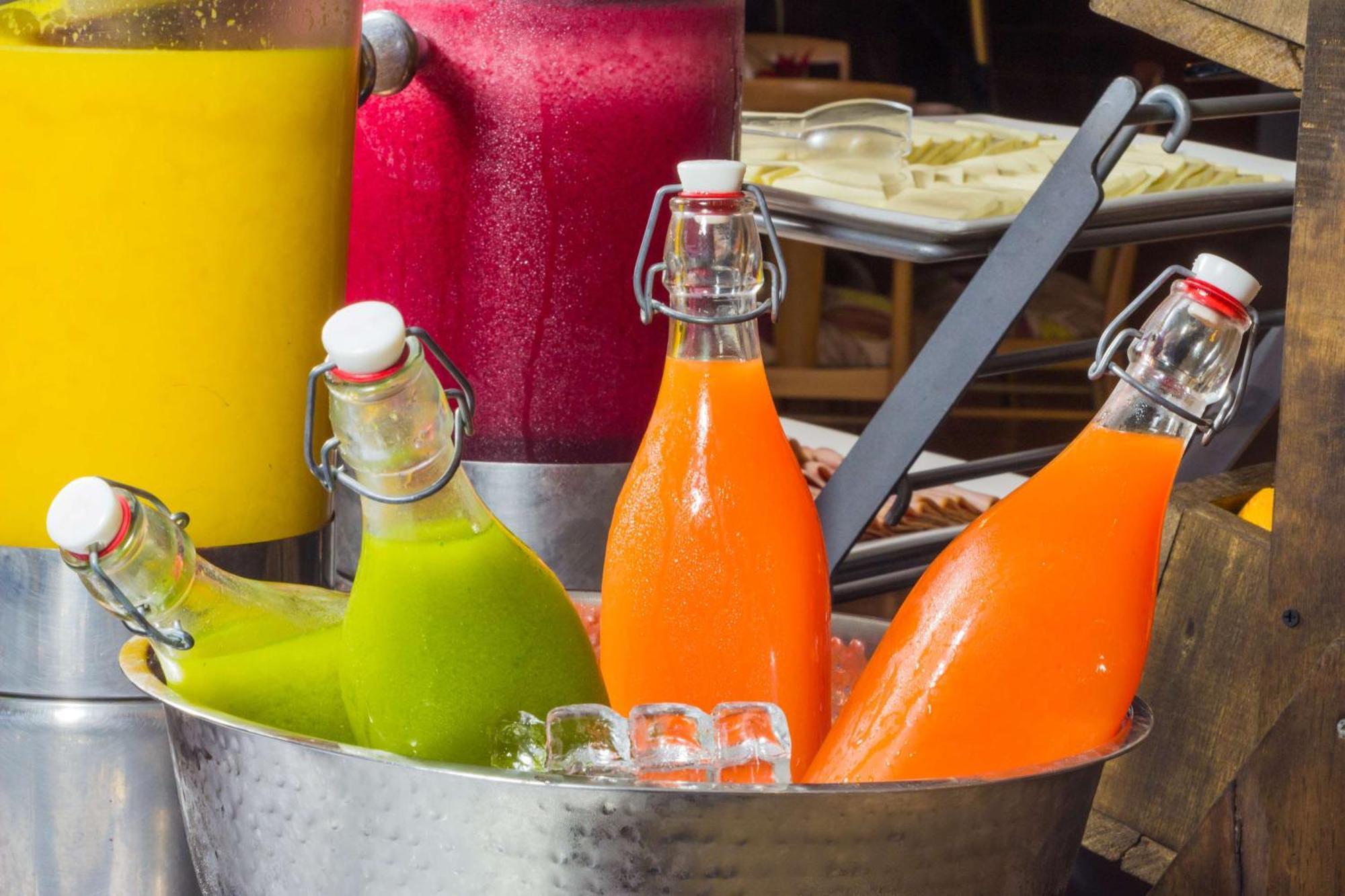 Sonesta Hotel Pereira Cerritos Exterior photo Bottles of fruit juice